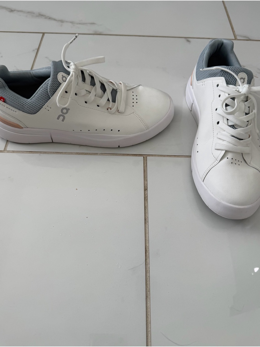 On Running White Sneakers with Gray and Peach Accents